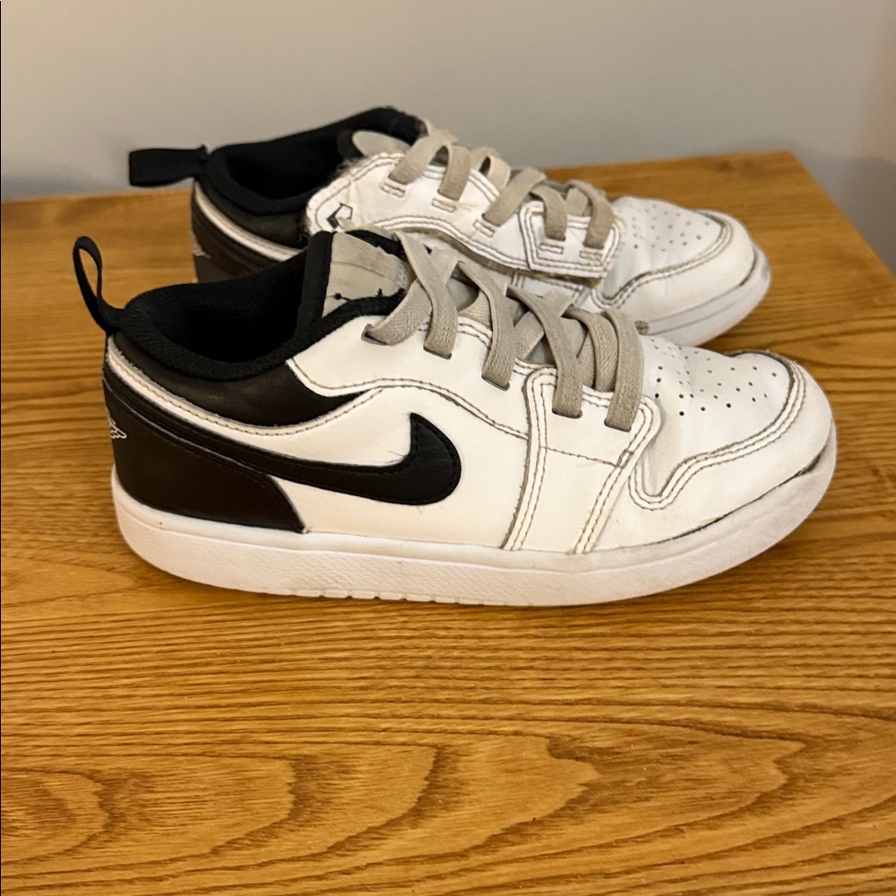 Nike Kids Air Jordan low alt shoe. Black and White. Size 1.5Y